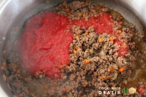 add tomatoes to ground beef