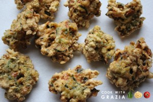 zucchini fritters on paper